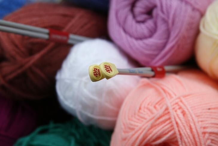 Knitting needles and balls of wool are displayed at the Knitting and Stitching show at Alexandra Palace in London, October 8, 2014. The show which includes over 600 exhibitors and 300 workshops is the largest textile and craft event in Britain. REUTERS/Stefan Wermuth (BRITAIN - Tags: SOCIETY BUSINESS TEXTILE)