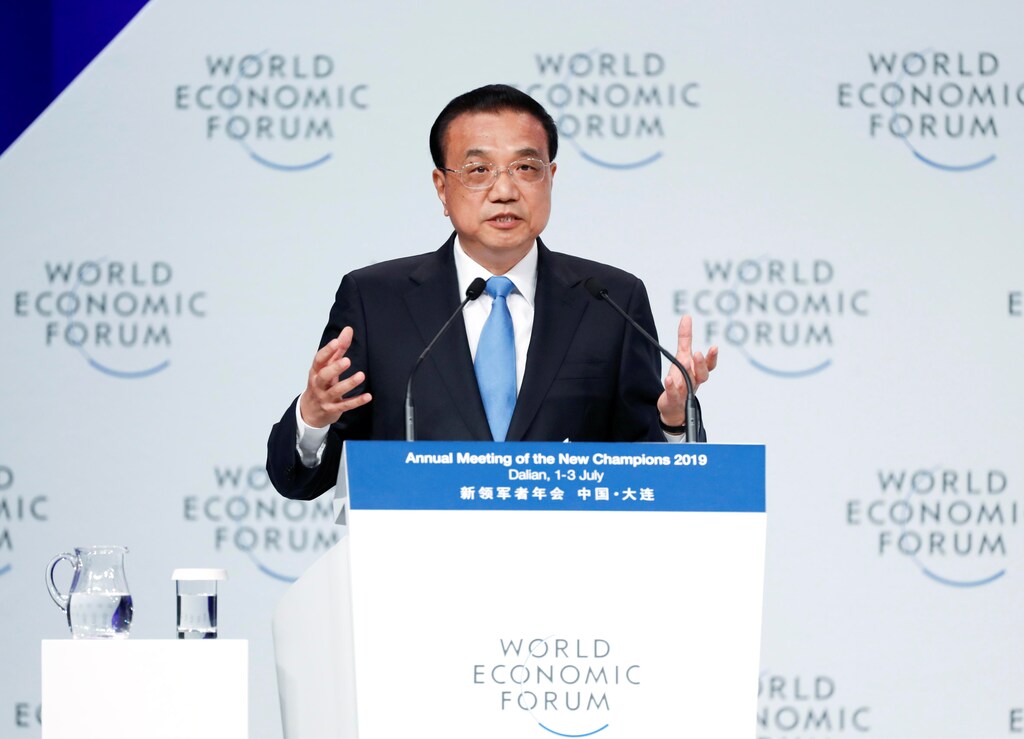Chinese Premier Li Keqiang speaks at the opening ceremony of World Economic Forum (WEF)'s Annual Meeting of New Champions 2019, or Summer Davos Forum, in Dalian, Liaoning province, China July 2, 2019. Picture taken July 2, 2019. Liu Zhen/CNS via REUTERS ATTENTION EDITORS - THIS IMAGE WAS PROVIDED BY A THIRD PARTY. CHINA OUT. - RC12AB5A1D80