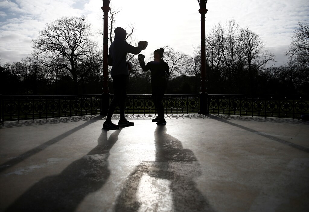 People are seen exercising in Greenwich Park, as the spread of the coronavirus disease (COVID-19) continues, London, Britain, March 29, 2020. REUTERS/Henry Nicholls - RC2LTF9B76QP