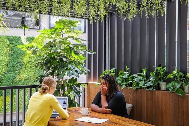 People work together at the Airbnb office headquarters in the SOMA district of San Francisco, California, U.S., August 2, 2016. REUTERS/Gabrielle Lurie