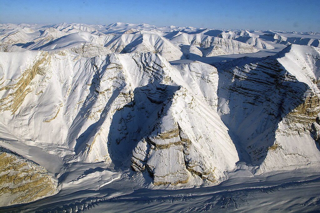 Glaciers on Canada's Ellesmere Island are seen during a NASA Operation IceBridge survey flight April 1, 2014. IceBridge is a six-year NASA airborne mission which will provide a yearly, multi-instrument look at the behavior of the Greenland and Antarctic ice, according to NASA. Picture taken April 1, 2014. REUTERS/Michael Studinger/NASA/Handout (GREENLAND - Tags: SCIENCE TECHNOLOGY ENVIRONMENT) ATTENTION EDITORS - THIS PICTURE WAS PROVIDED BY A THIRD PARTY. REUTERS IS UNABLE TO INDEPENDENTLY VERIFY THE AUTHENTICITY, CONTENT, LOCATION OR DATE OF THIS IMAGE. THIS PICTURE IS DISTRIBUTED EXACTLY AS RECEIVED BY REUTERS, AS A SERVICE TO CLIENTS. FOR EDITORIAL USE ONLY. NOT FOR SALE FOR MARKETING OR ADVERTISING CAMPAIGNS - GM1EA490DHF01