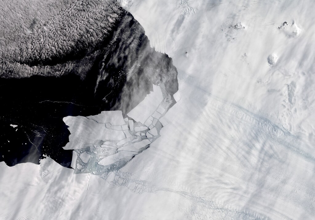 Icebergs detach from the Pine Island Glacier in Antarctica, one of the continent's fastest-retreating glaciers, February 11, 2020. Iceberg B-49, the largest piece on the upper left, is about twice the size of Washington, D.C. NASA Earth Observatory/Lauren Dauphin/Handout via REUTERS THIS IMAGE HAS BEEN SUPPLIED BY A THIRD PARTY - RC2M6K9B1TU4