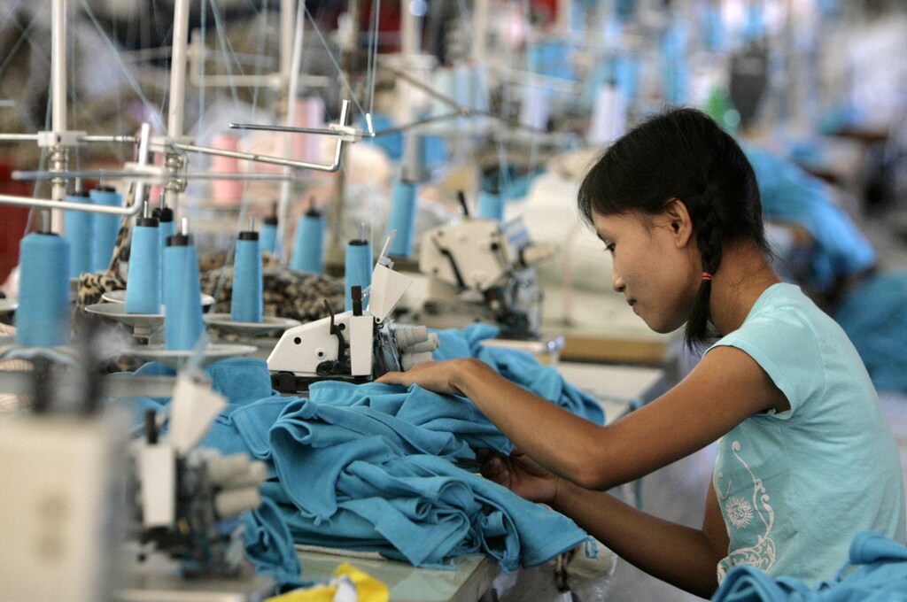 A Myanmar migrant works in a Taiwanese-owned garment factory in the northwestern Thai town of Mae Sot May