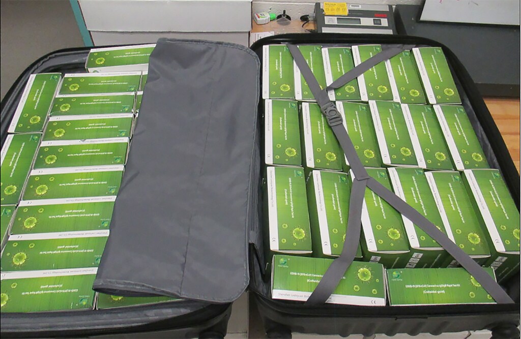 A suitcase containing 1,000 counterfeit COVID-19 Rapid Tests is seen after they were seized from a Mexican man by U.S. Customs and Border Protection (CBP) officers at the Santa Teresa border crossing in El Paso, Texas, U.S. May 16, 2020. Picture taken May 16, 2020.