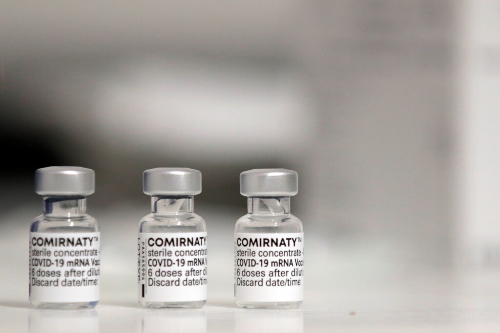 Vials of the "Comirnaty" Pfizer-BioNTech COVID-19 vaccine are seen at a coronavirus disease (COVID-19) vaccination center installated in front of Paris town hall, France, July 7, 2021. REUTERS/Sarah Meyssonnier - RC2OFO9B27A9