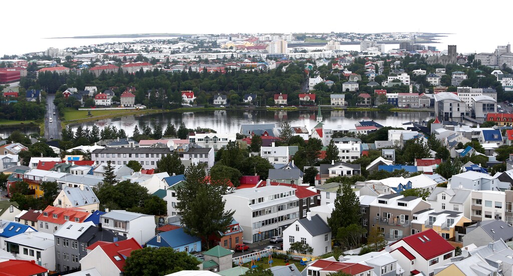 A general view shows the city of Reykjavik, seen from Hallgrimskirkja church, Iceland August 4, 2017. REUTERS/Michaela Rehle - RC16F92E2820