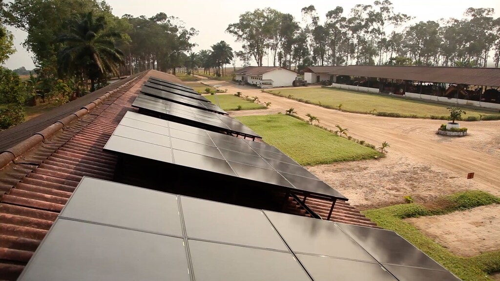 This image shows solar panels on rooftops, illustrating the need to be climate resilient