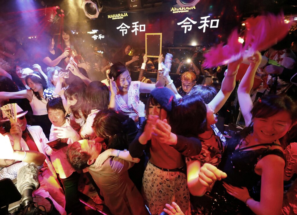 People celebrate the start of Japan's new Reiwa imperial era
