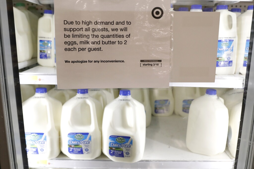 A sign is seen on the milk and dairy display case at a Target store in Manhattan during the outbreak of the coronavirus disease (COVID-19) in New York City, New York, U.S., April 1, 2020. REUTERS/Brendan Mcdermid - HP1EG411CSD1W