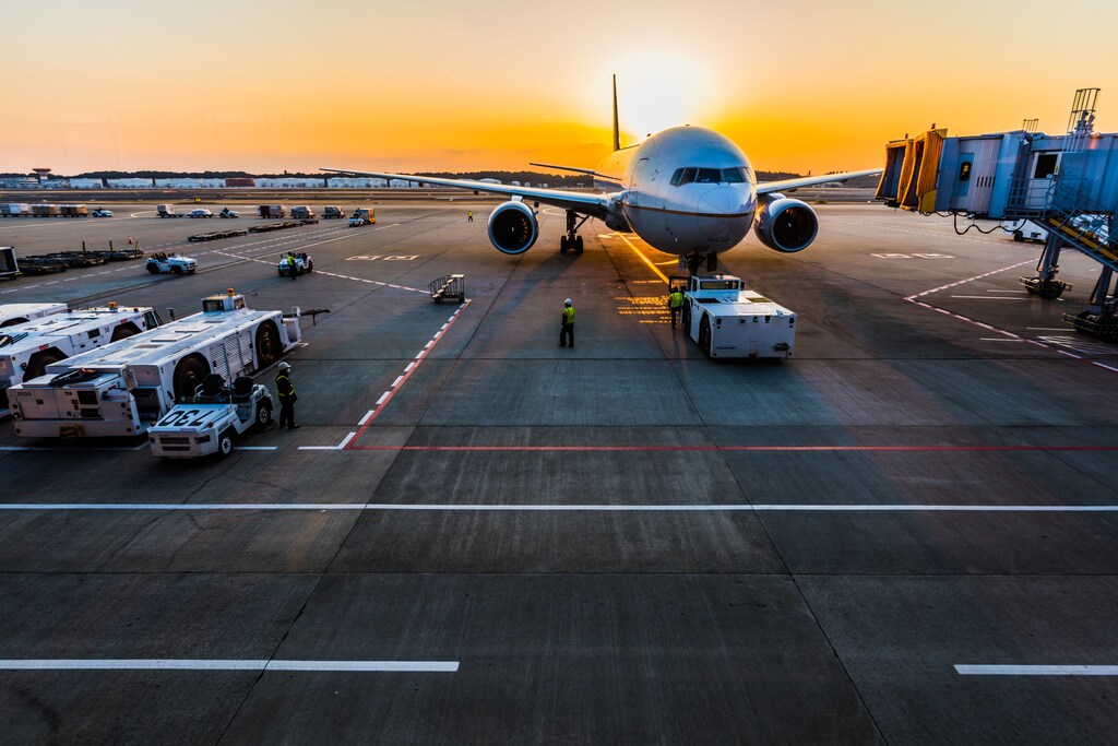 A shot of an aeroplane parked at an airport, illustrating the drive towards aviation decarbonisation