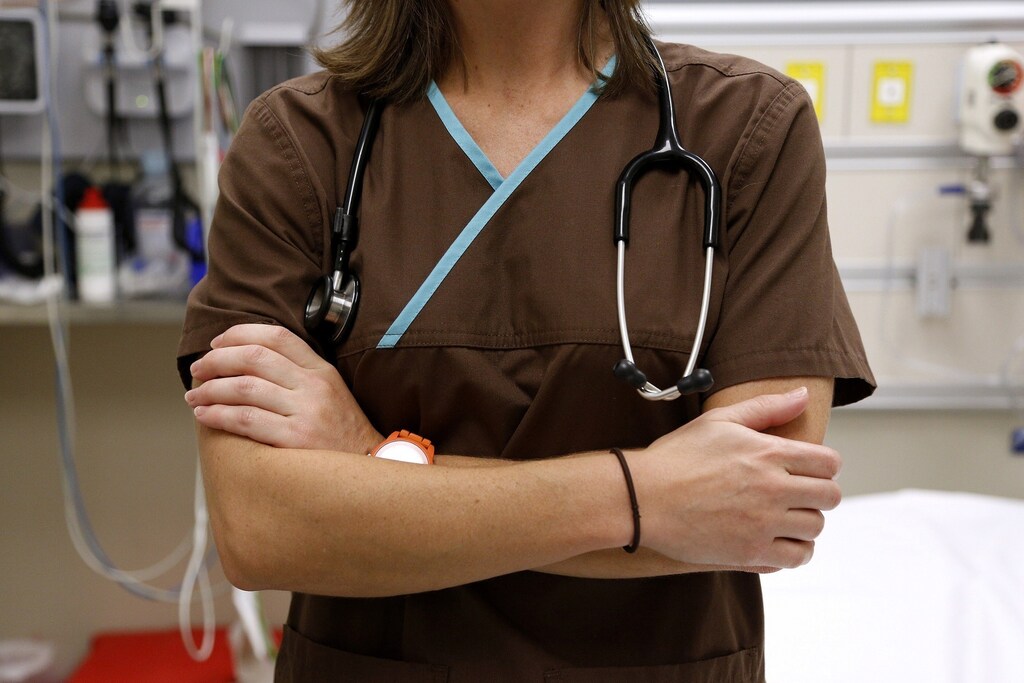 Registered Nurse Rebecca Moak poses for a photo in trauma center of the University of Mississippi Medical Center in Jackson, Mississippi October 4, 2013. Mississippi is one of at least 20 states that has decided not to expand Medicaid under the Affordable Care Act, better known as "Obamacare".