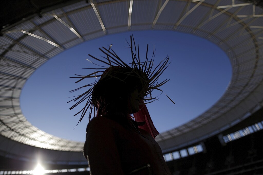 A rural woman worker sets up camp at the stadium Mané Garrincha before the March of the Daisies, calling for improved rights for women working in rural areas and forests, in Brasilia, August 11, 2015.