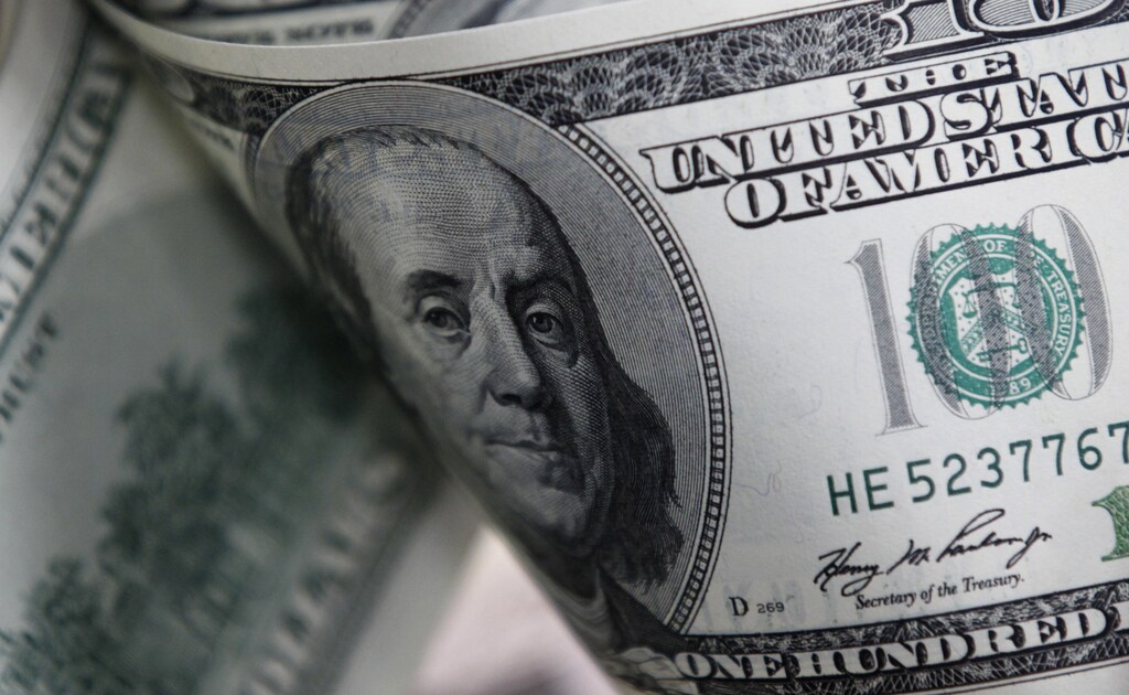 U.S. one hundred dollar notes are seen in this picture illustration taken in Seoul February 7, 2011.