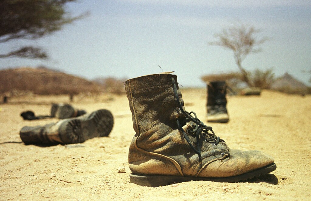The dicarded boots of captured Ethiopian soldiers lie on thebattlefield near the western Eritrean town of Tesseney June 6, 2000.The Eritrean government said on Tuesday it had recaptured the town fromEthiopian forces after a day-long battle which forced thousands morecivilians from their homes, adding to the region's humanitarian crisis.NO RIGHTS CLEARANCES OR PERMISSIONS ARE REQUIRED FOR THIS IMAGE REUTERS/Sami SallinenSS/AA - RP2DRIDFFJAA