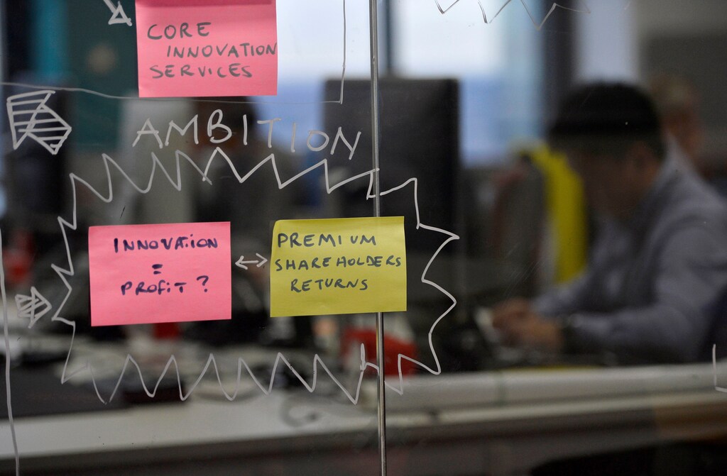 Post-it notes are displayed in the UBS "fintech lab" at Canary Wharf in London, Britain, October 19, 2016.