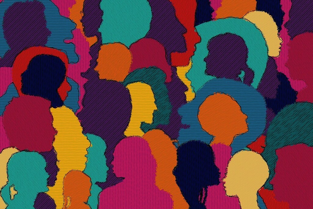 Multicoloured heads in a crowd