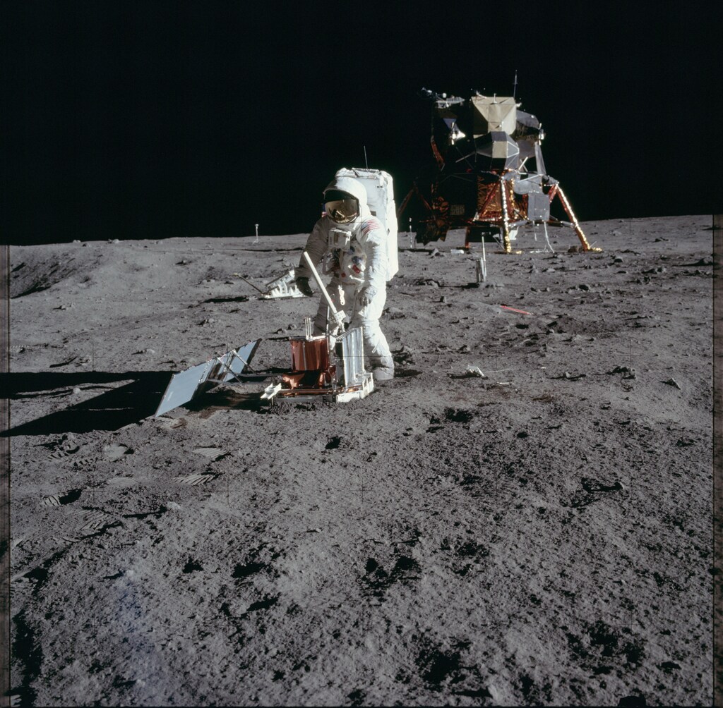 Astronaut Edwin E. Aldrin Jr., lunar module pilot, deploys a scientific research package on the surface of the moon near the Lunar Module (LM) "Eagle" during the Apollo 11 extravehicular activity (EVA) in this July 20, 1969 NASA handout photo. The photograph is one of more than 12,000 from NASA's archives recently aggregated on the Project Apollo Archive Flickr account. REUTERS/NASA/Handout via Reuters ATTENTION EDITORS - THIS IMAGE WAS PROVIDED BY A THIRD PARTY. EDITORIAL USE ONLY - TM3EC7Q1CAJ01