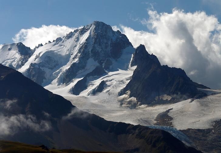 The Aiguille Verte mountain summit is pictured on the Mont-Blanc Massif from Emosson, Switzerland, August 9, 2017. REUTERS/Denis Balibouse