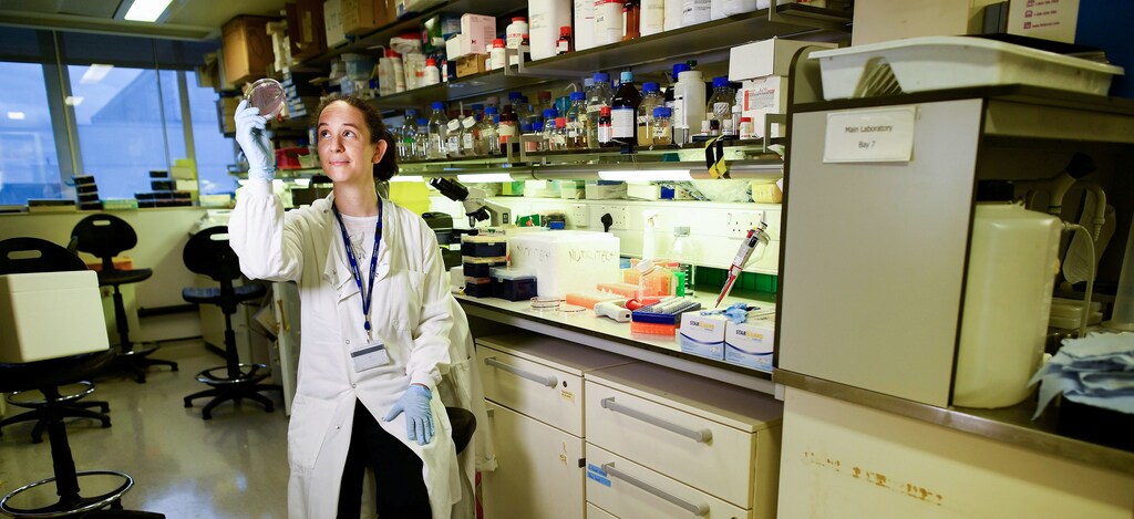 Dr Catherine Reynolds, 37, a scientific researcher at Imperial College, poses for a picture at her laboratory in London,