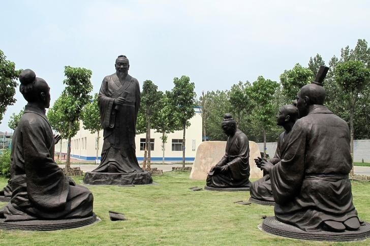 Sculptures of Confucius with his students are seen near the headquarters office building of Chambroad Holding in Boxing, Shandong Province, China, June 27, 2016. REUTERS/Aizhu Chen