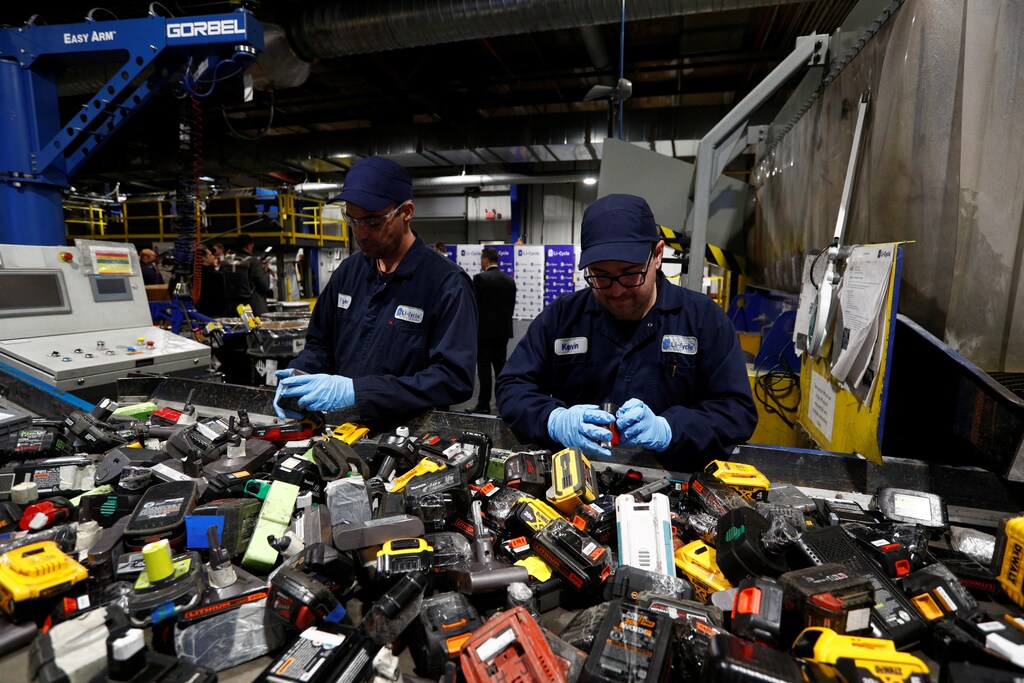 Workers sort batteries at the lithium-ion battery recycling firm Li-Cycle, in Kingston, Ontario, Canada March 7, 2023.