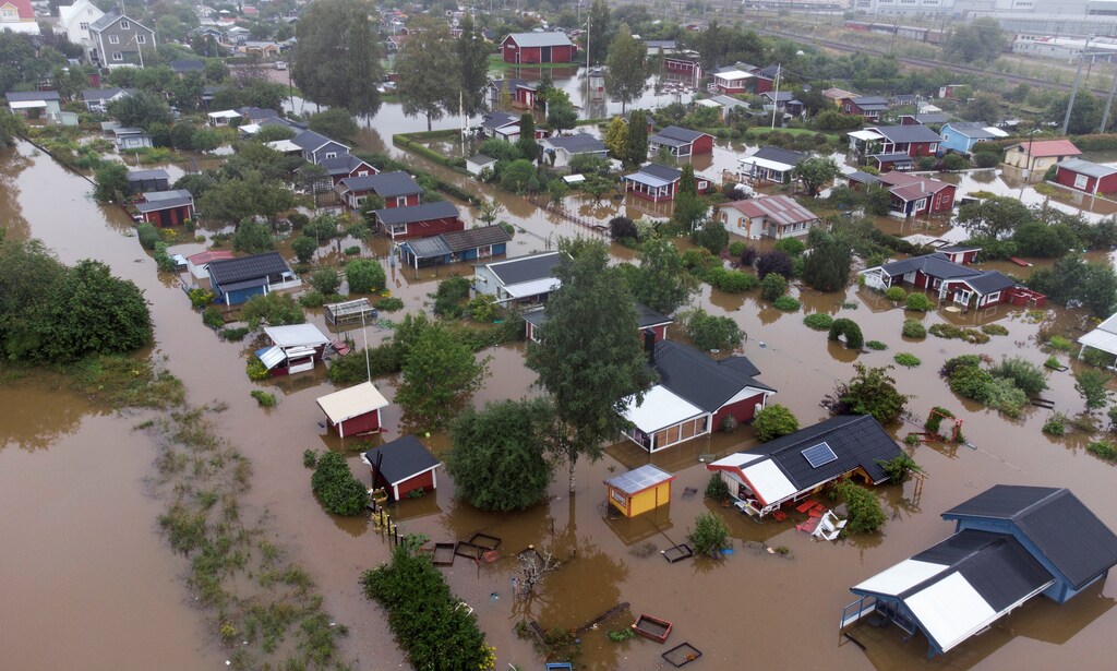 aerial view over a flooded residential area at Sodra Kungsvagen, in Gavle, Sweden, August 18, 2021
