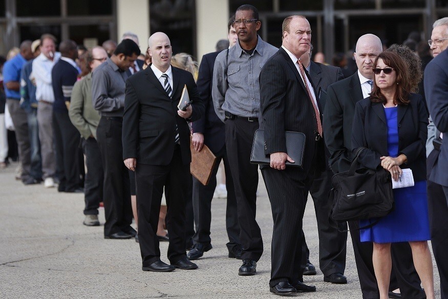 People wait in line to enter the Nassau County Mega Job Fair at Nassau Veterans Memorial Coliseum in Uniondale, New York October 7, 2014. U.S. job openings rose to their highest level in more than 13 years in August even as hiring fell, the U.S. Department of Labor said. REUTERS/Shannon Stapleton (UNITED STATES - Tags: BUSINESS EMPLOYMENT) - RTR49ANN