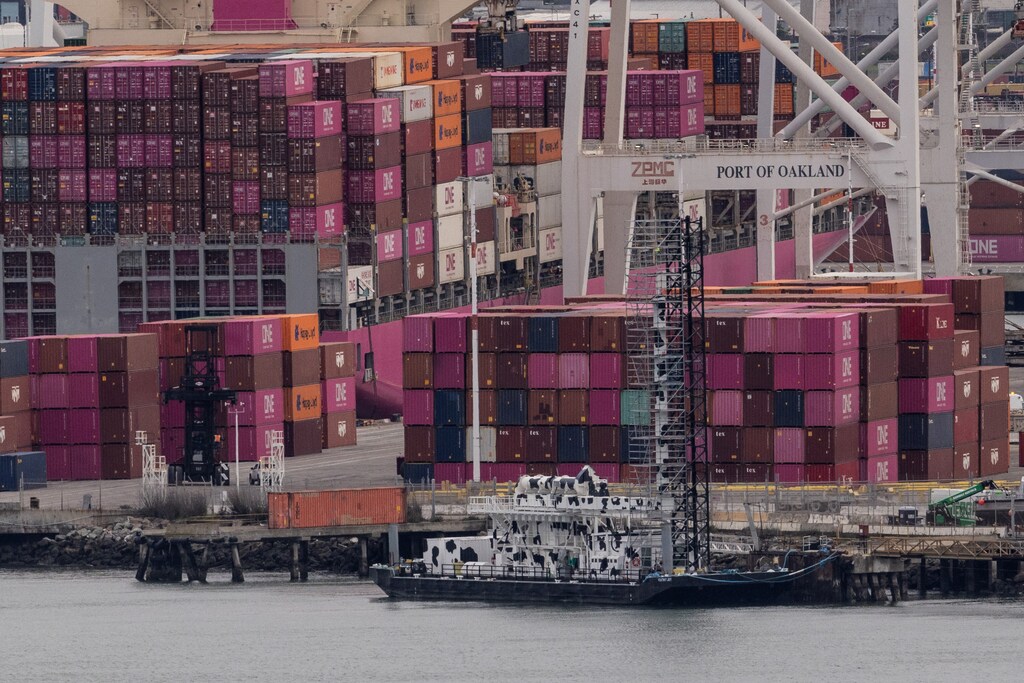 A cargo ship full of shipping containers is seen at the port of Oakland as trade tensions escalate over US tariffs, in Oakland, California February 3, 2025: Models of global trade are shifting