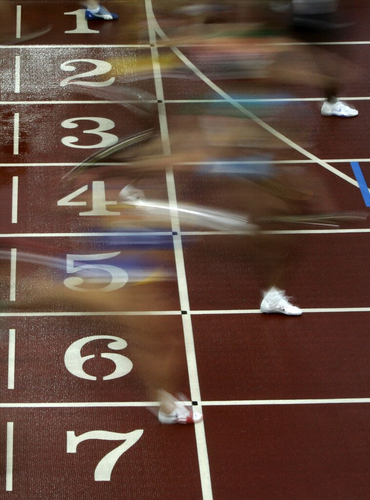 Competitors cross the finish line in a women's 100 metres semi-final at the world athletics championships in Helsinki. Competitors cross the finish line in a women's 100 metres semi-final race at the world athletics championships in Helsinki August 8, 2005. Rain stopped just before the competition continued for the third day at the world championships on Monday. REUTERS/Alessandro Bianchi - RP6DRMWJMNAB