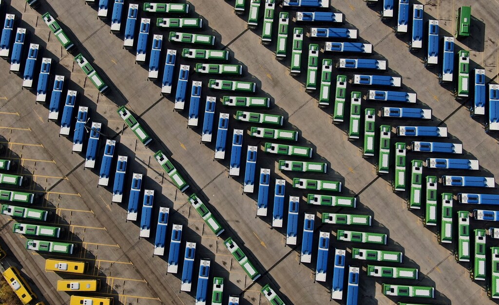 An aerial view shows buses parked in a depot after public transport was stopped, as Georgian government imposes stricter restrictions to stop the spread of the coronavirus disease (COVID-19), in Tbilisi, Georgia November 28, 2020. Picture taken with a drone. REUTERS/Irakli Gedenidze TPX IMAGES OF THE DAY - RC2ACK9RZQSV