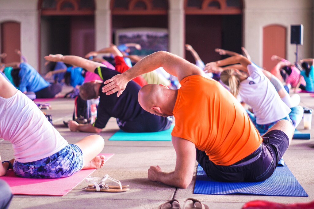 People in a yoga class strengthening their muscles.