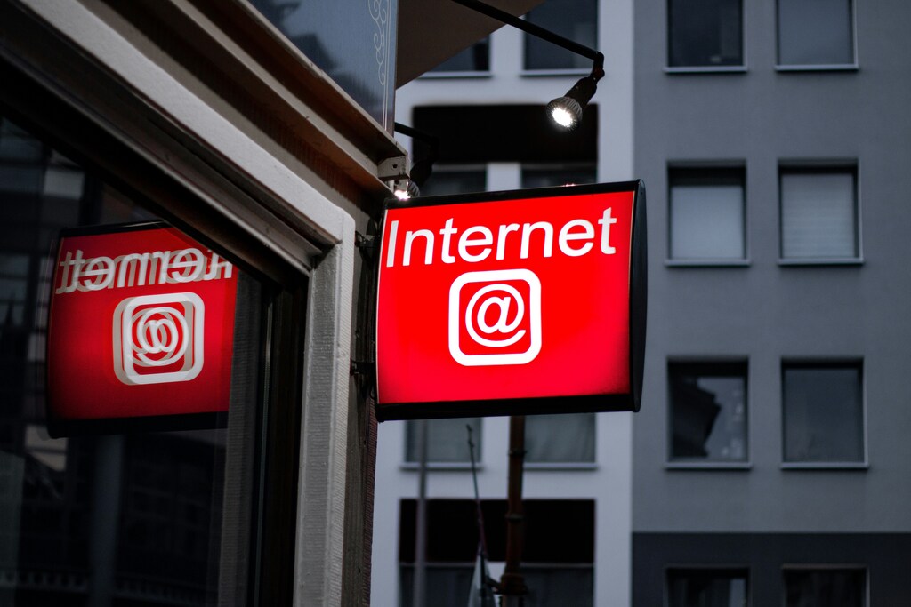 Sign outside of a building that reads 'Internet'.
