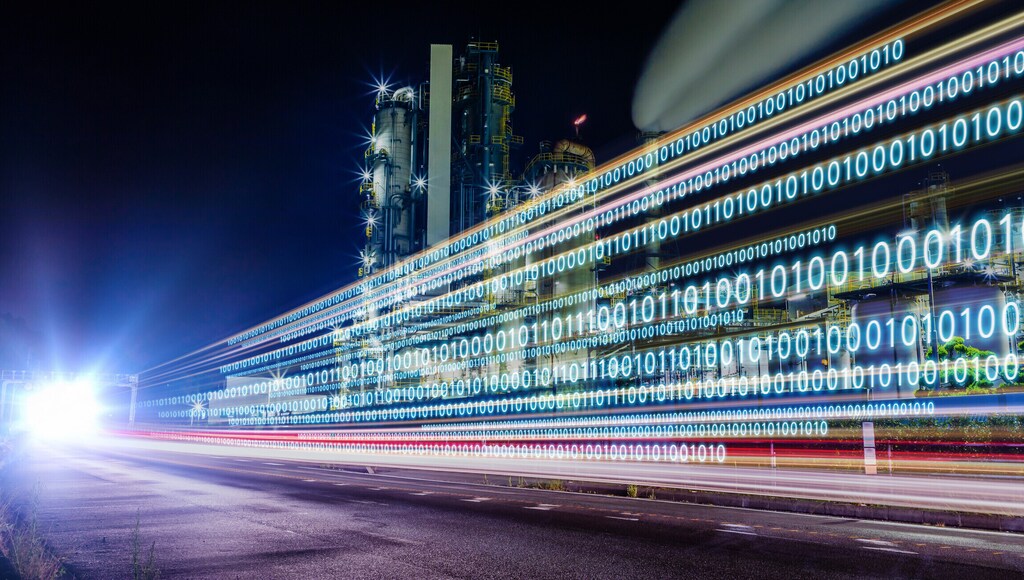 An information highway with binary numbers streaming across a city scape: Japan’s Ministry of Economy, Trade and Industry is incentivizing digital transformation.