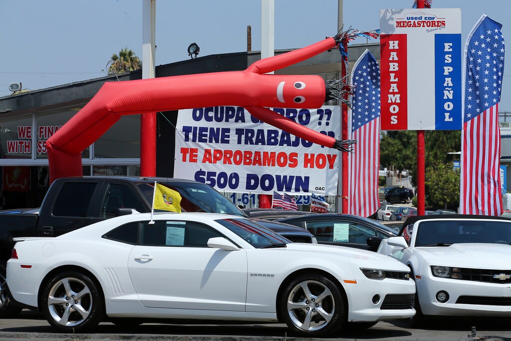 Cars are shown for sale with financing at a car lot in National City, California, U.S., June 30, 2017.Picture taken June 30, 2017. REUTERS/Mike Blake - RTX3D240