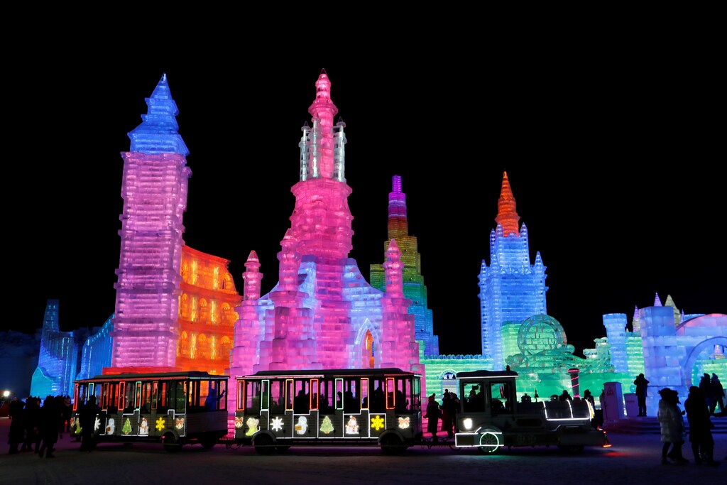 Ice sculptures illuminated by colored lights are seen at annual ice festival, in the northern city of Harbin, Heilongjiang province, China January 4, 2019. REUTERS/Tyrone Siu - RC1700DA3330