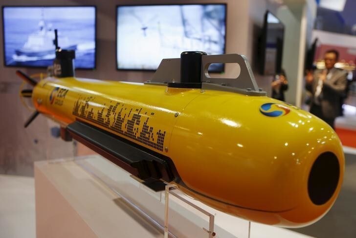 An autonomous underwater vehicle used for surveying the sea floor is displayed at the ECA Robotics booth at the IMDEX Asia maritime defence exhibition in Singapore May 19, 2015. The 10th international maritime defence show which sees participation from 180 exhibitors and delegations from over 40 countries takes place from May 19 to 21. REUTERS/Edgar Su