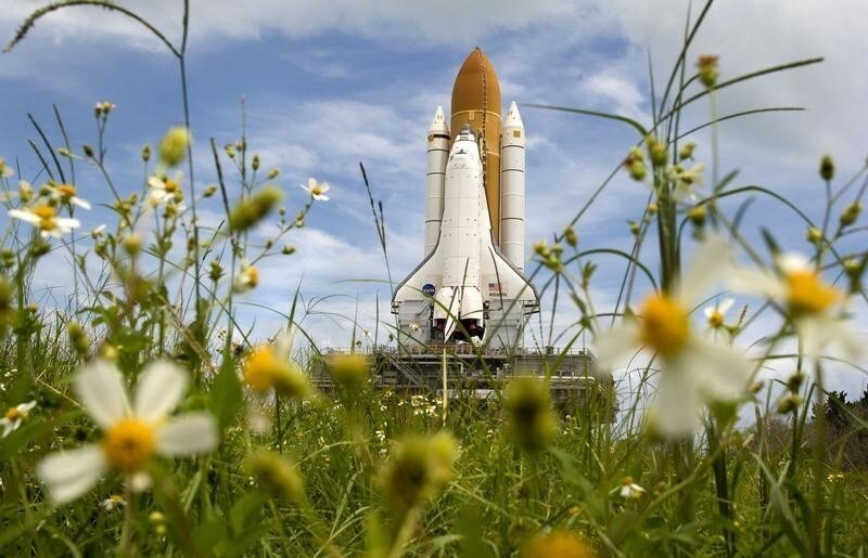 The space shuttle Atlantis makes the the three-mile trip from the vehicle assembly building to launch pad 39A at Kennedy Space Center in Cape Canaveral, Florida September 4, 2008.