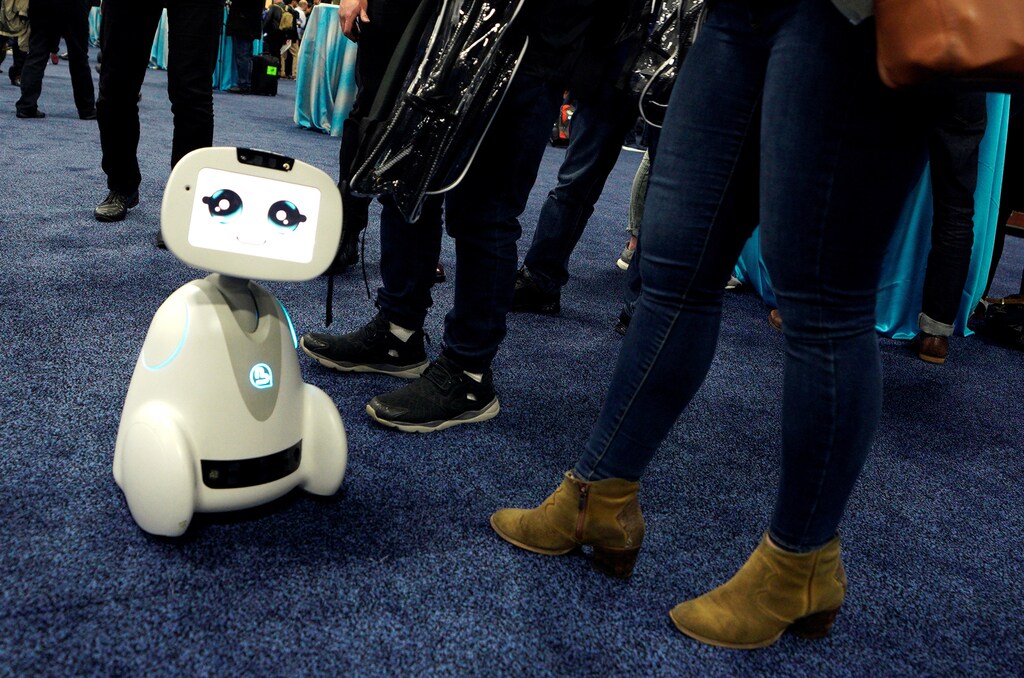 A Buddy robot by Blue Frog roams the floor during the opening event at CES in Las Vegas, Nevada, U.S. January 7, 2018.