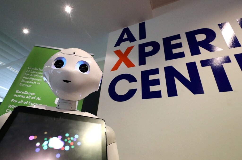 Un Robot en una feria tecnológica. Los principales expertos en IA creen que la inteligencia artificial tendrá un profundo impacto en la sociedad.