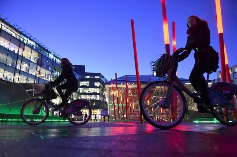Cyclists ride dublinbikes in Dublin's docklands area, Ireland February 17, 2016. To match Insight IRELAND-ELECTION/INEQUALITIES REUTERS/Clodagh Kilcoyne - GF10000316878