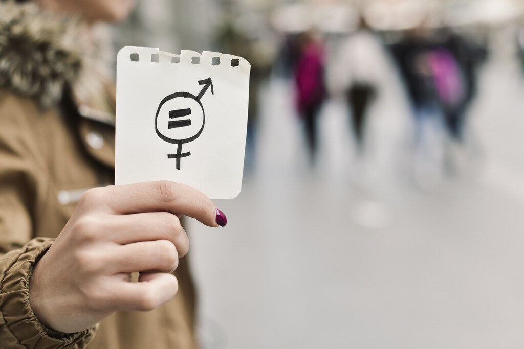 Eye looks to the future business. Woman's eye in the double exposure of a modern city and technology: We could see more women in leadership with more skills focus, especially regarding artificial intelligence.