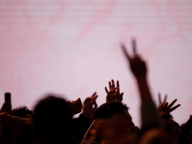 Supporters of Cristina Fernandez de Kirchner, former Argentine President and candidate for the Senate in the mid-term elections, wait for her appearance at her campaign headquarters in Buenos Aires, Argentina, October 22, 2017. REUTERS/Martin Acosta - RC1DCCCD22A0