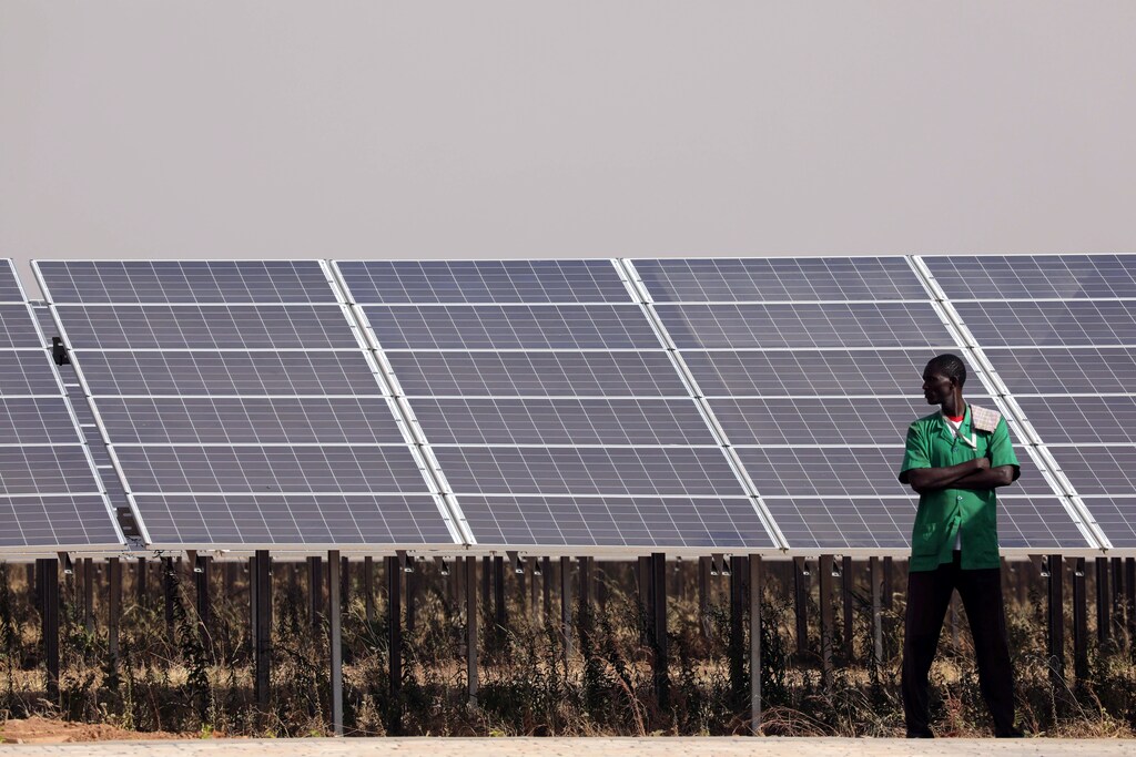 Solar panels are seen during the inauguration ceremony of the solar energy power plant in Zaktubi, near Ouagadougou, Burkina Faso, November 29, 2017. REUTERS/Ludovic Marin/Pool