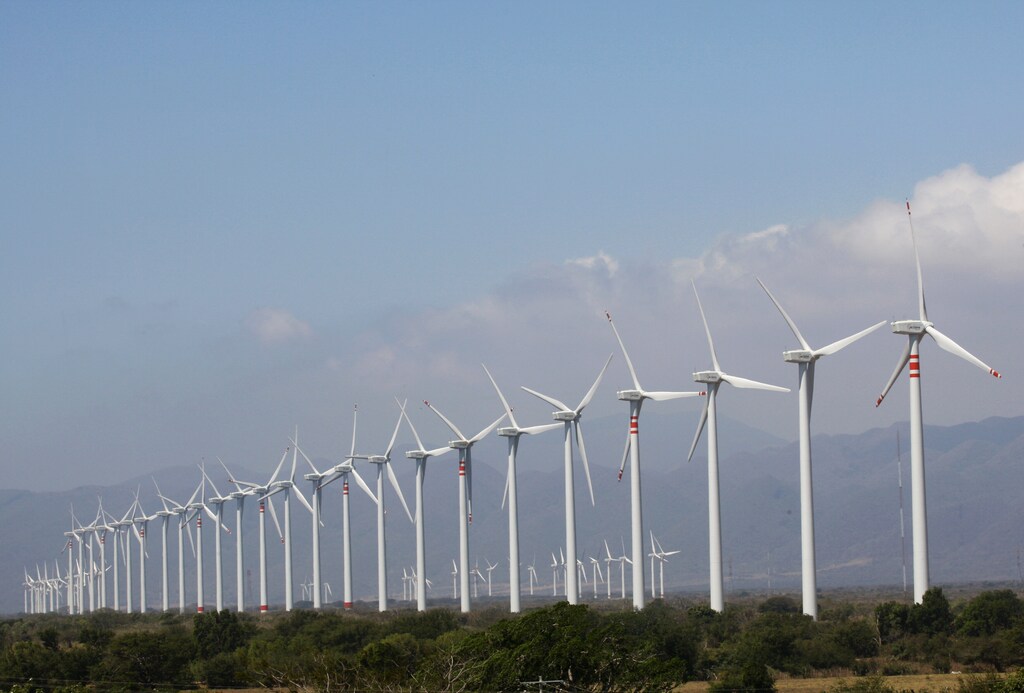 A wind farm with multiple wind turbines. More investment is urgently needed to roll out transformative climate technologies and research new innovations to help cut emissions.