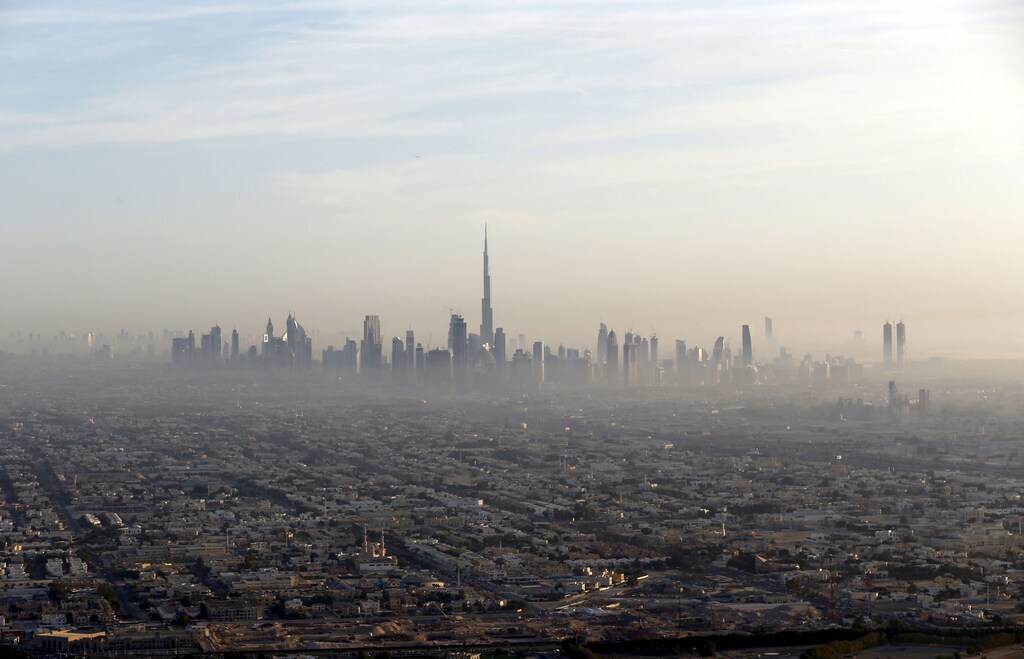 A general view of Dubai and the world's tallest tower, the Burj Khalifa (C), December 9, 2015. Photo taken December 9, 2015. REUTERS/Karim Sahib/Pool - RTX1Y3EF