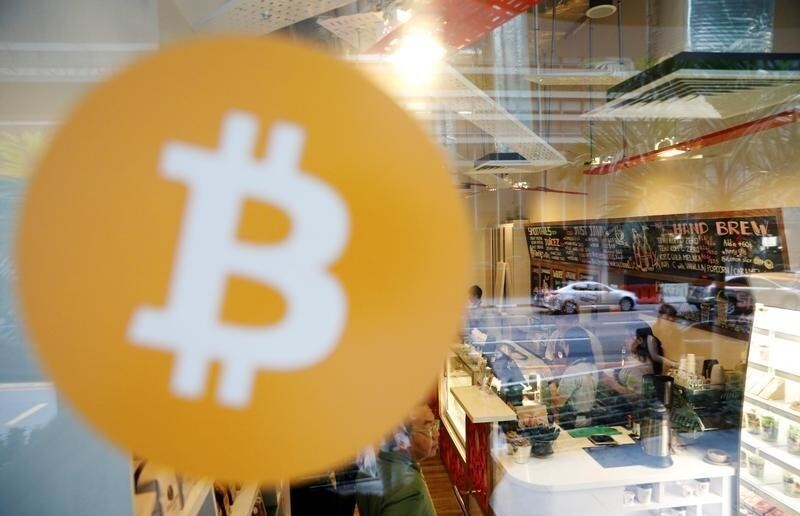 A view of Ducatus cafe, the first cashless cafe that accepts cryptocurrencies such as Bitcoin, on their opening day in Singapore December 21, 2017. REUTERS/Edgar Su - RC1362ADD010