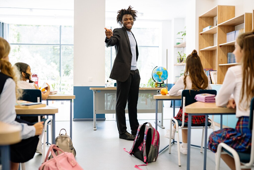 A teacher teaching students in a classroom