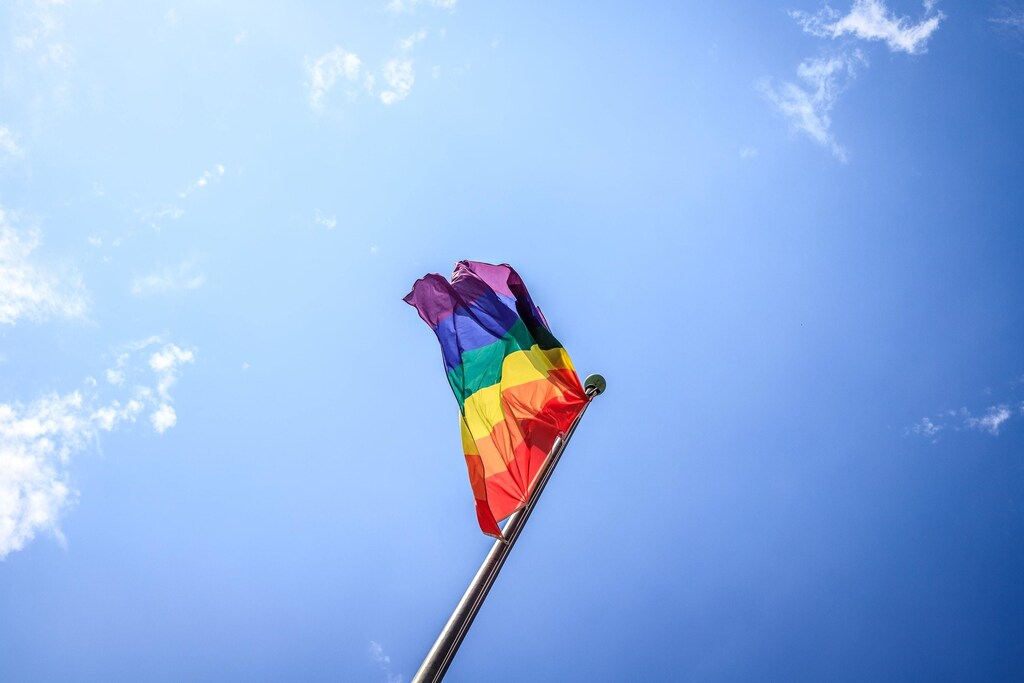 a pride flag blowing
