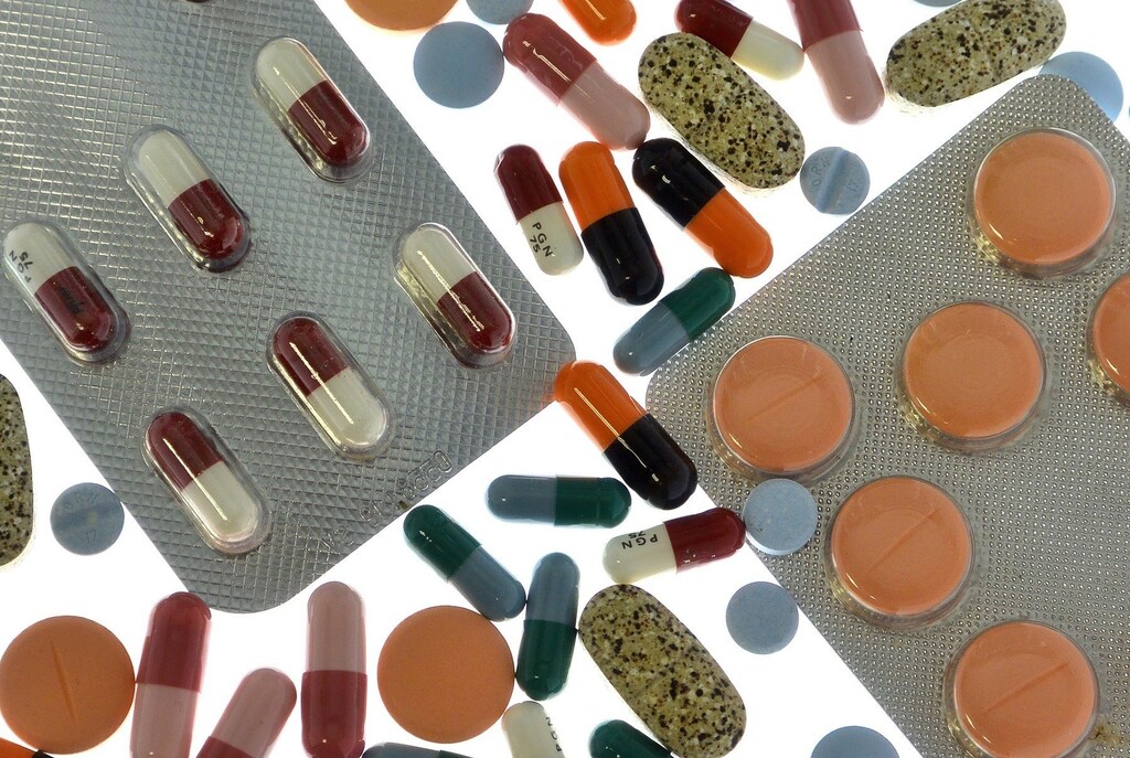 Pharmaceutical tablets and capsules in foil strips are arranged on a table in this picture illustration taken in Ljubljana September 18, 2013. Picture taken September 18. REUTERS/Srdjan Zivulovic (SLOVENIA - Tags: HEALTH) - RTX15K29
