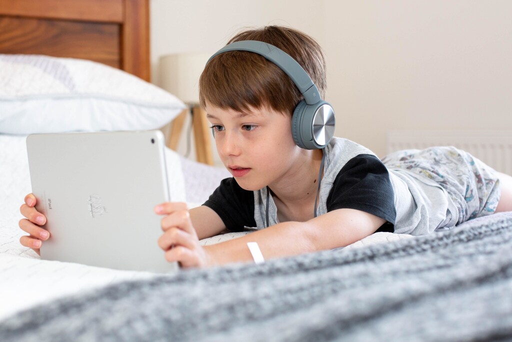 A child using an electronic tablet